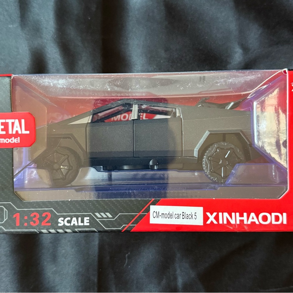 New XINHAODI Black Metal Cybertruck with 4 Wheeler Pull Back and Go Toy Car